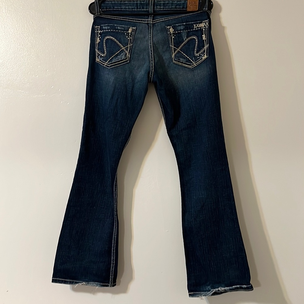 BKE size 29 low rise boot cut/mini flare jeans, dark wash.